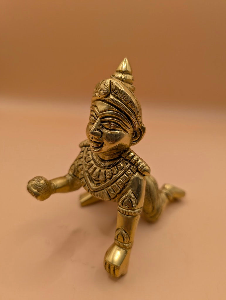 Crawling Laddoo Krishna – Divine Figurine of Playful Devotion