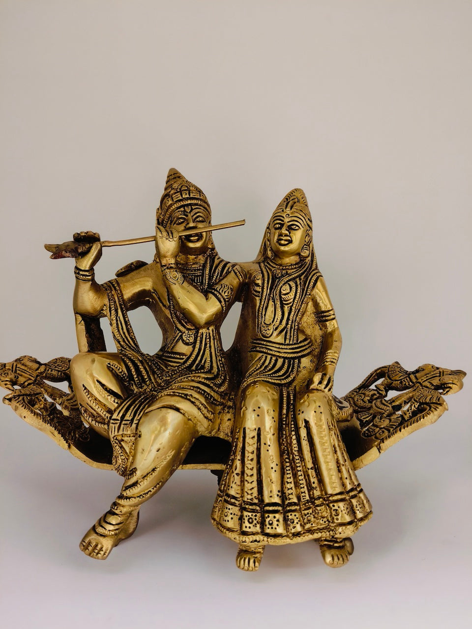 Radha and Krishna on Bench with Flute – Symbol of Love and Friendship