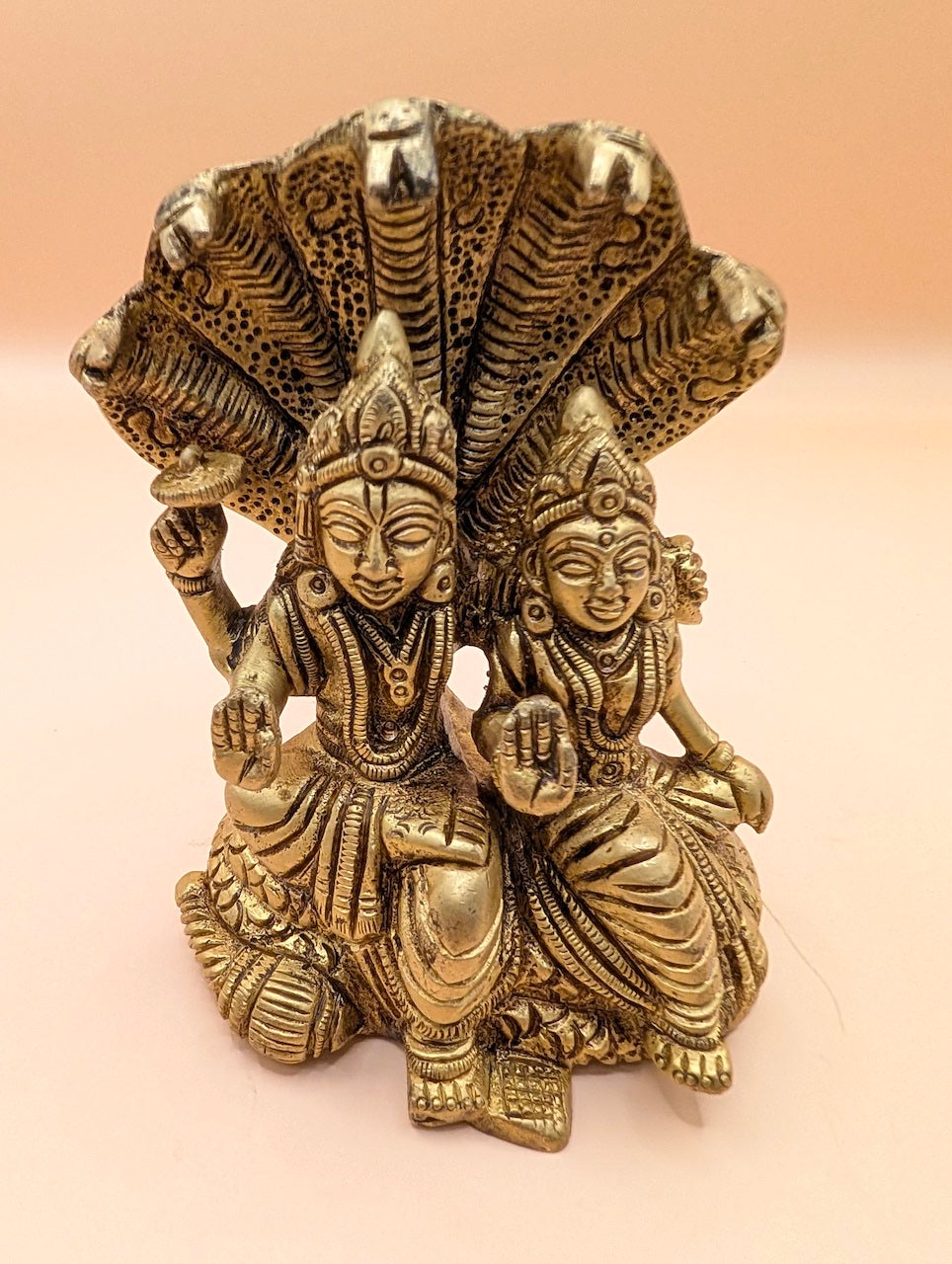 Vishnu and Lakshmi on Adiseshan – Divine Couple Sculpture