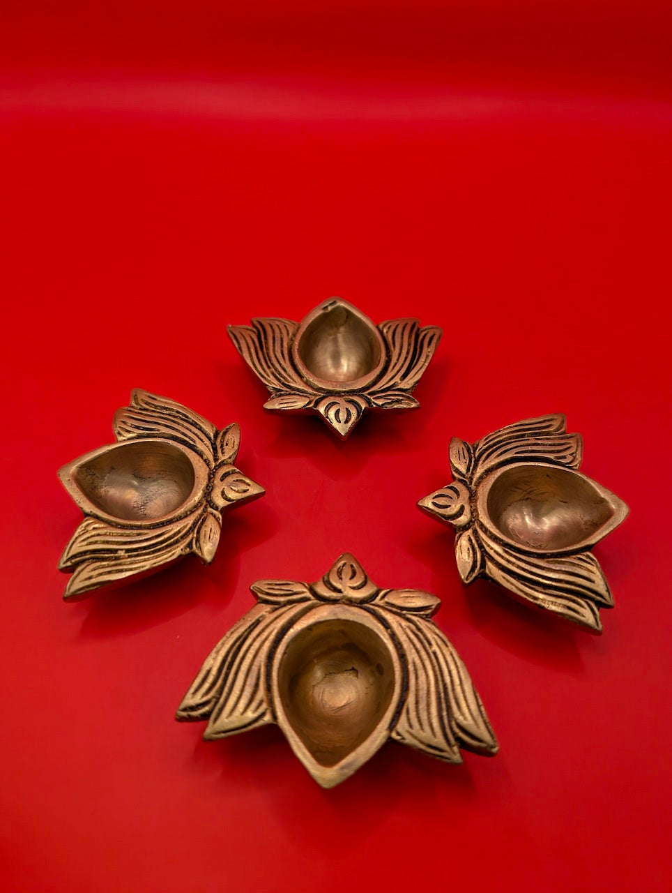 Set of 4 Brass Lotus Diyas – Elegant Light for Prayer and Decor