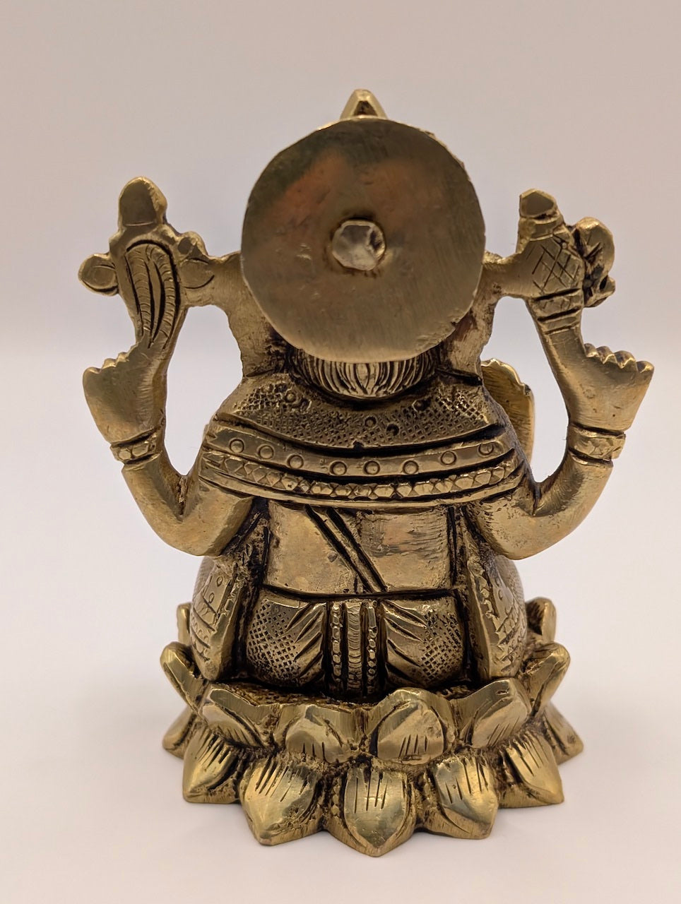 Ganesh on Lotus – Divine Protector Against Evil