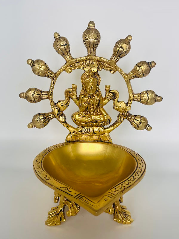 Antique Brass Lakshmi Diya – Handcrafted Lakshmi Oil Lamp with Elephant Arch for Home Mandir & Diwali Decor